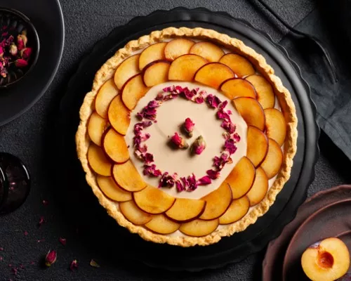 Tarte à la crème épicée aux prunes